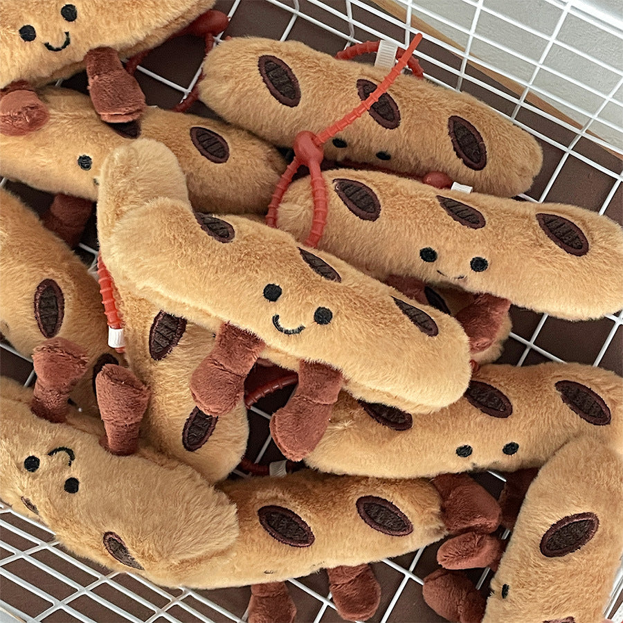 Several baguette plush keychains gathered in a white basket