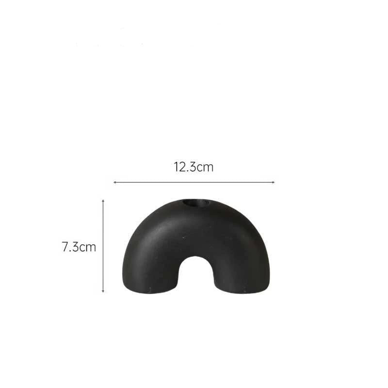 Black ceramic candle holder with clear measurement marks showing 12.3cm width and 7.3cm height