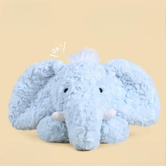 Soft blue elephant plush toy lying down, showcasing fluffy texture and playful ears