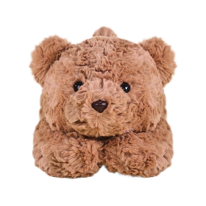 Close-up of brown teddy bear plush toy with endearing expression, paws forward