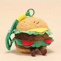 Side view of burger plush keychain with layered plush details and smiling expression