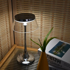The lamp displayed as an elegant bedside light, blending with decor and offering gentle, restful illumination.