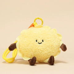 Front view of egg tart plush keychain with a smiling face and yellow plush body
