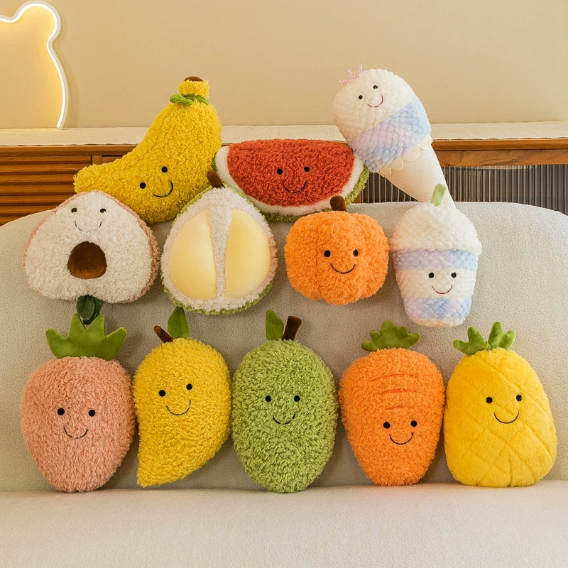 Group of assorted fruit plush toys piled together for a cozy, inviting display