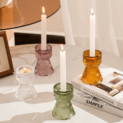 Versatile glass candle holders shown with stick candles, expressing romantic vibes