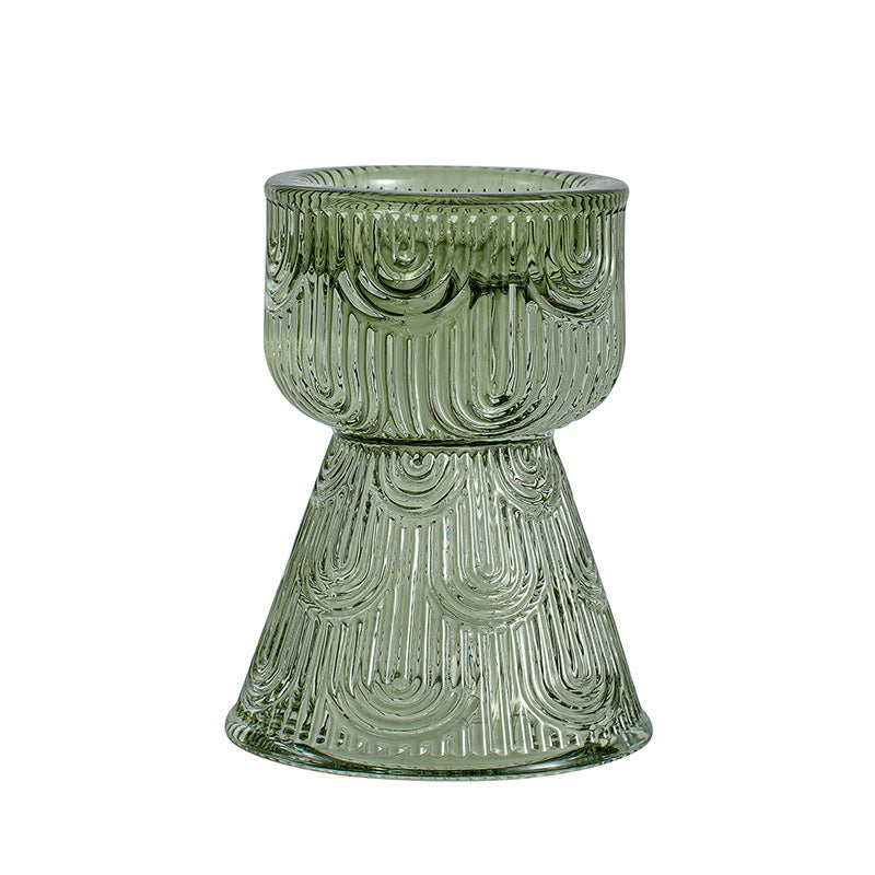 Chic green glass candle holder with pattern detail, perfect for stylish home decor