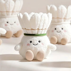 A group of shuttlecock plush keychains in warm light, highlighting the plush softness and endearing faces.