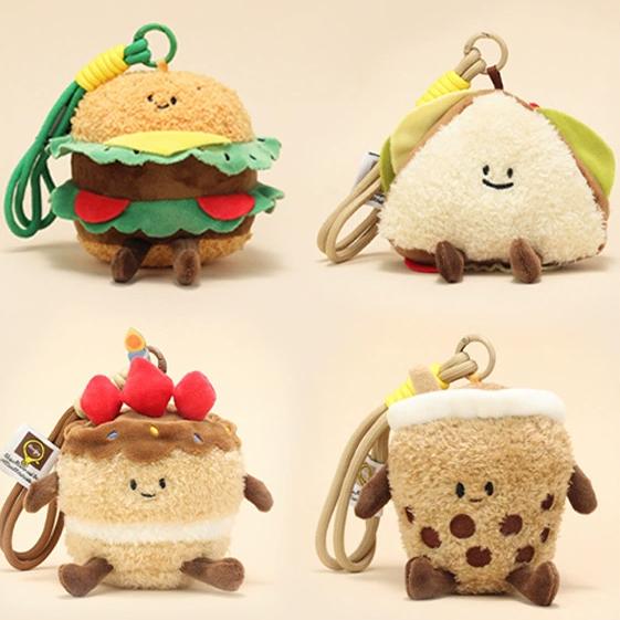 Four distinct food-themed plush keychains: burger, sandwich, milk tea, and cake