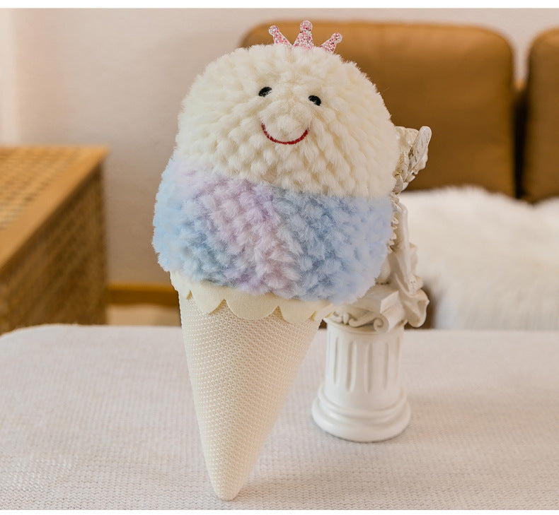 Pastel ice cream cone plush toy with creamy blue shades and a sparkling crown