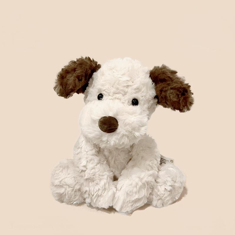 Jack the Sad Puppy Plush placed on light beige background, ready to bring comfort