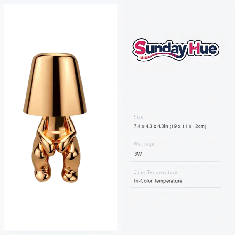 Gold Soulster Lamp in a soft, upright posture, exuding warmth and silent protection