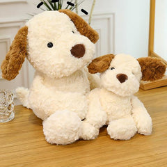 Little Dog Jack 2.0 Plush Toys on a wooden table, radiating companionship