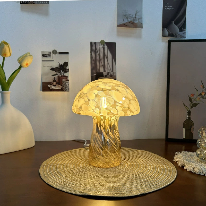 Vintage mushroom glass desk lamp illuminates a simple, modern room with warm lighting.