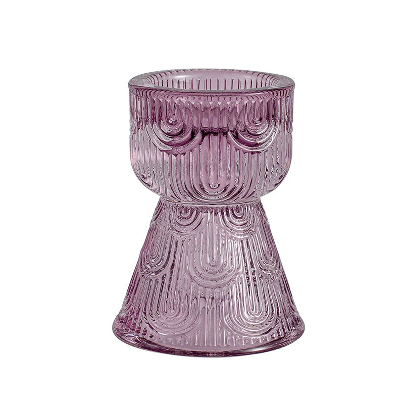 Elegant purple glass candle holder with unique vertical and arch stripes, highlighting texture