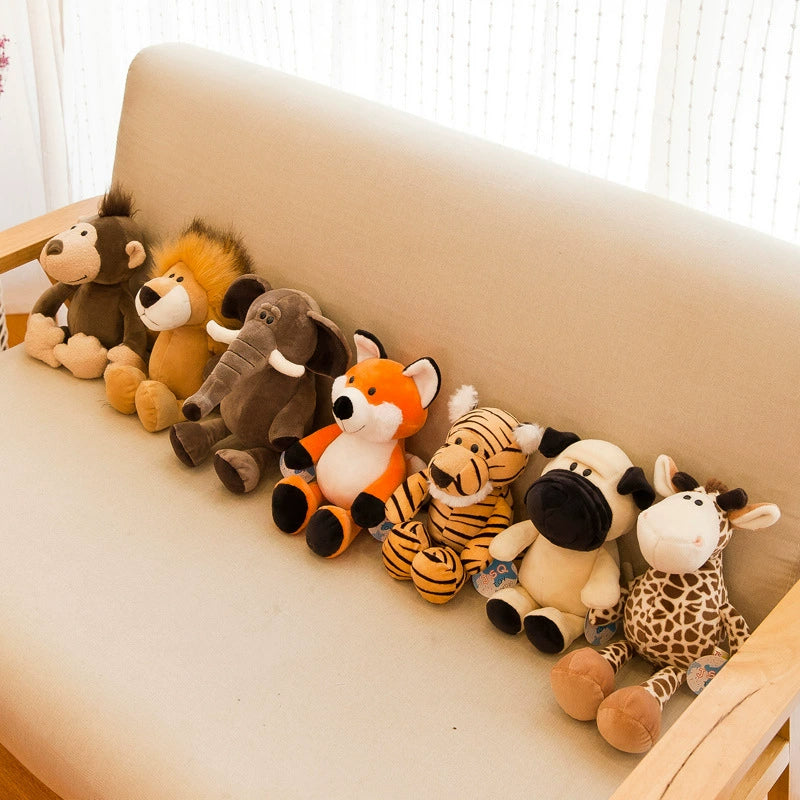 Multiple forest animal plush toys lined up on a sofa, representing inclusivity, comfort, and emotional warmth as Plush Toys