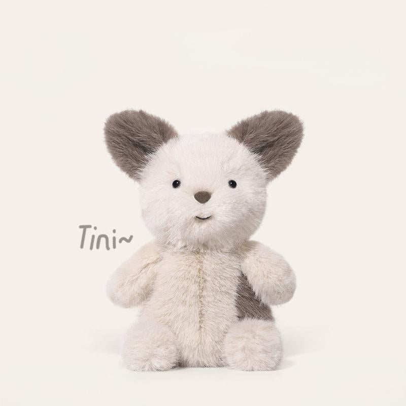 Adorable dog plushie from Tiny Animal Series with long fur and big ears