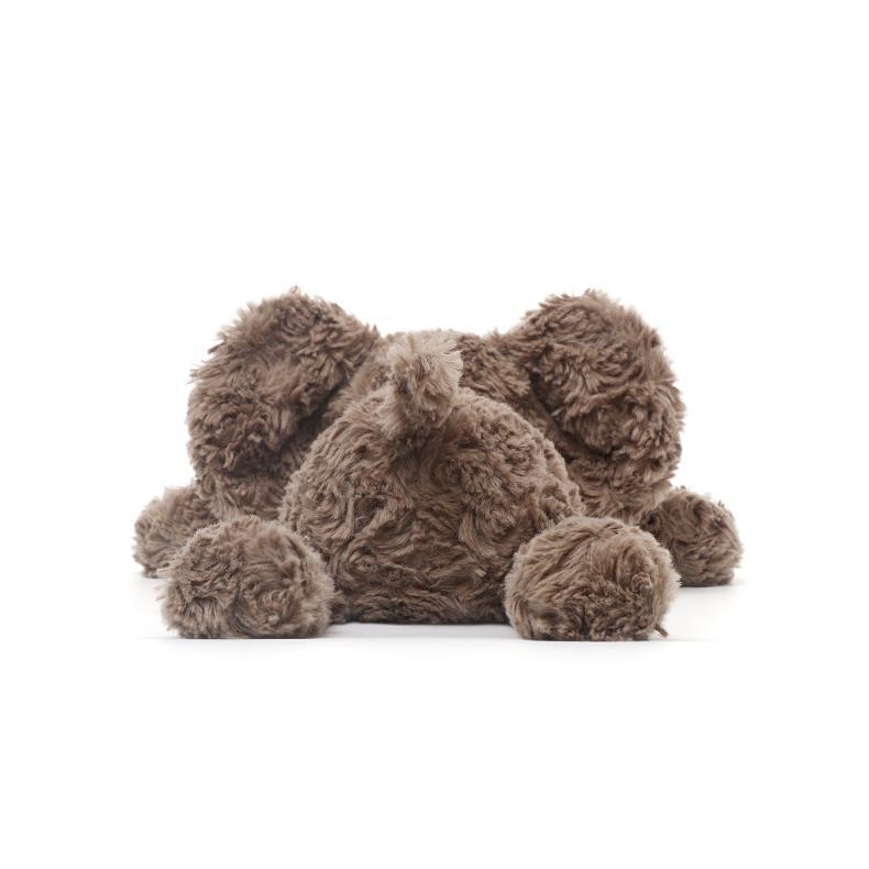  Back view of elephant laying plush, highlighting its plush tail and fluffy back