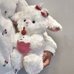 Princess Lamb Plush holding a dessert-themed rabbit, expressing companionship