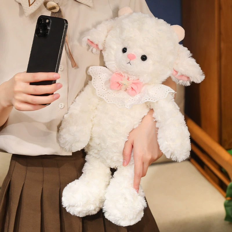 Princess Lamb Plush Toy held in hand, showing realistic size and soft fur texture