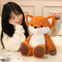 A girl enjoying the company of the Running Fox Plush Toy, radiating comfort and joy.
