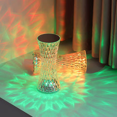 Water Ripple Aurora Decorative Lamp casting vibrant red and green wave reflections on the wall and table, creating a mesmerizing ambient atmosphere.