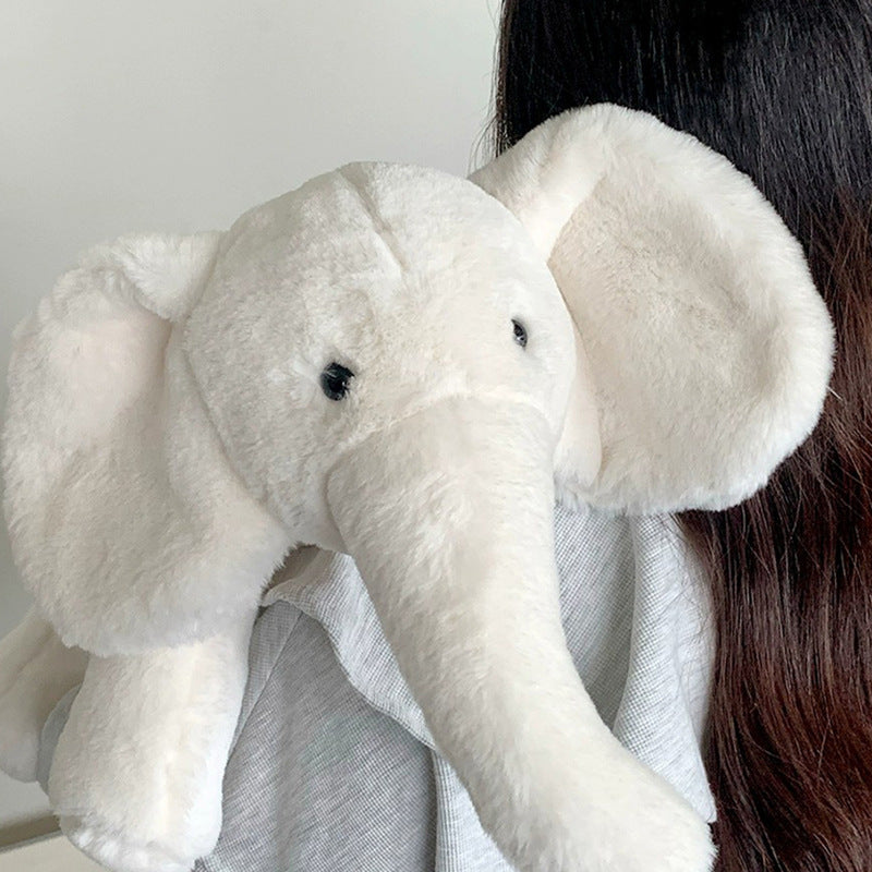 White elephant plush toy gently draped on a person’s shoulder, perfect for warm companionship and comfort.